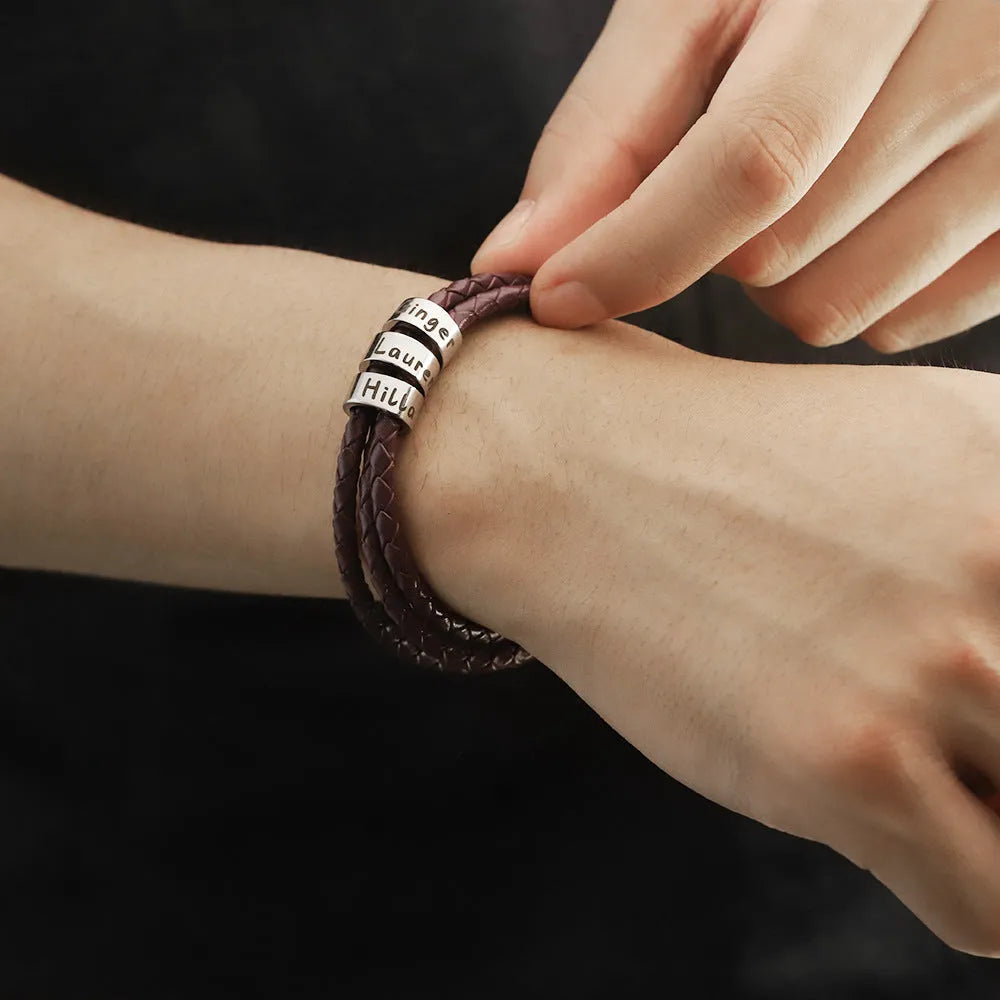 BRACELET EN CUIR TRESSÉ AVEC ANNEAUX PERSONNALISÉS EN ACIER
