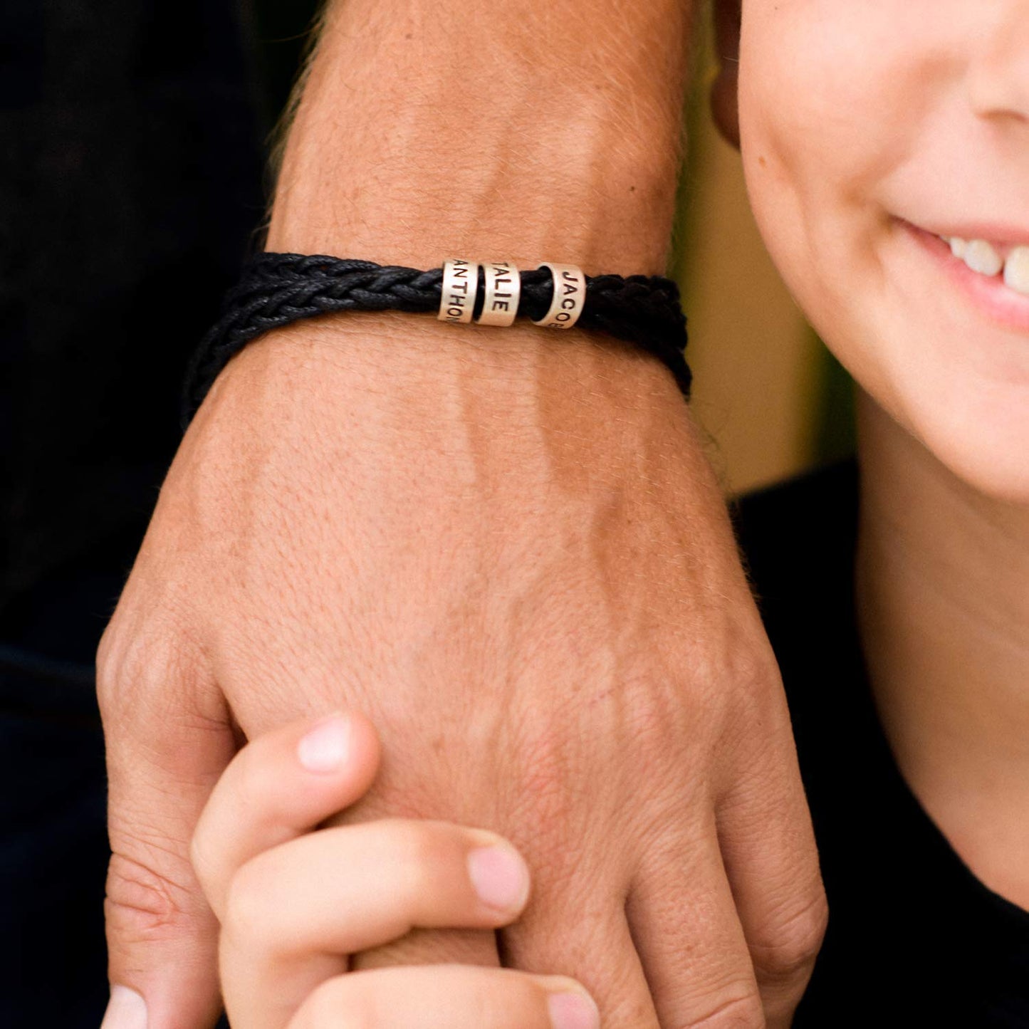 BRACELET EN CUIR TRESSÉ AVEC ANNEAUX PERSONNALISÉS EN ACIER