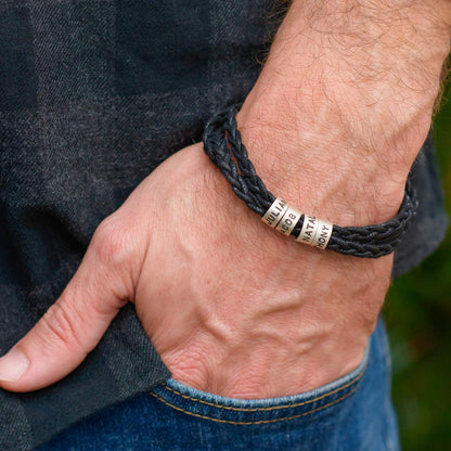 BRACELET EN CUIR TRESSÉ AVEC ANNEAUX PERSONNALISÉS EN ACIER